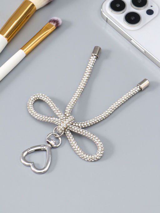 Цена за 2 шт. Брелок на карабине "Бант со стразами" серебро 11х7,5х1,5 см