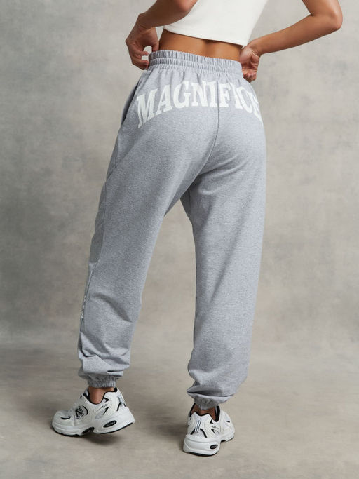 Серые спортивные брюки с глубокими карманами и манжетами