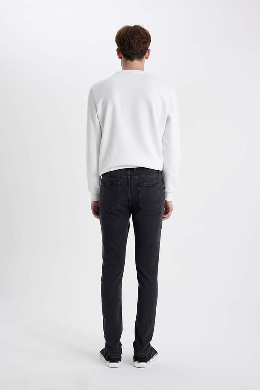 Супероблегающие джинсовые брюки с нормальной талией и очень узкими штанинами - Defacto фото 5