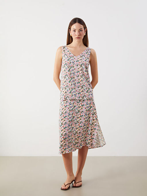 Beli Lastikli Y?rtma?l? ?i?ekli Etek