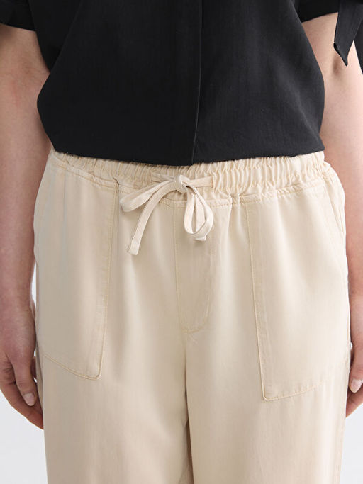 Джинсы Carrot Fit женские с эластичным поясом