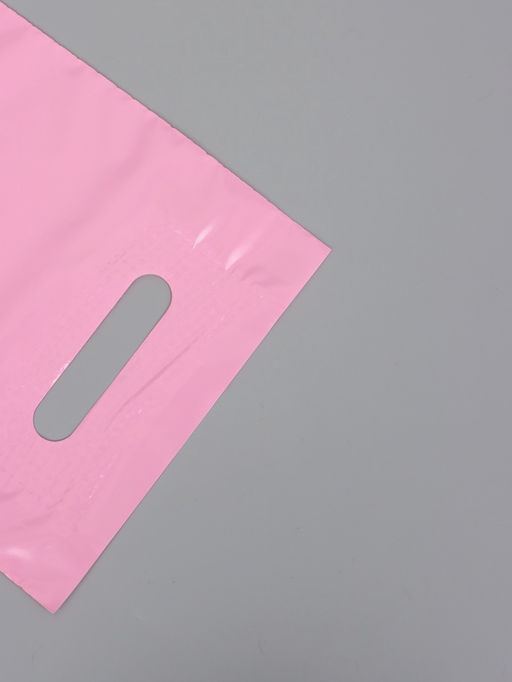 Цена за 50 шт. Пакет полиэтиленовый с вырубной ручкой, розовый 20×30 см, 60 мкм