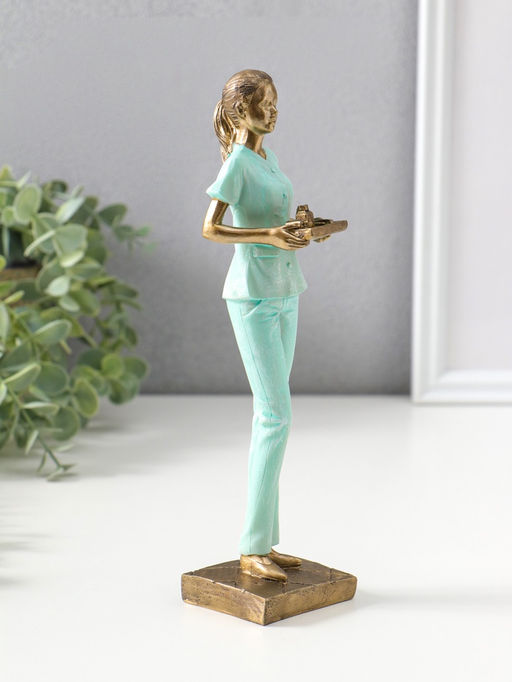 Сувенир полистоун "Медсестра в зелёном костюме с подносом с лекарствами" 23,5 см