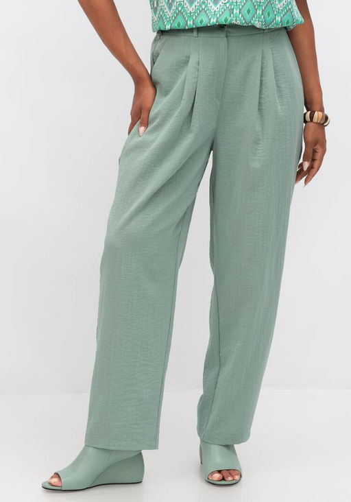 Брюки свободного кроя с защипами на поясе фисташковый