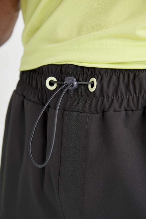 DeFactoFit Тканые спортивные штаны для бега стандартного кроя с двойными карманами  фото 5