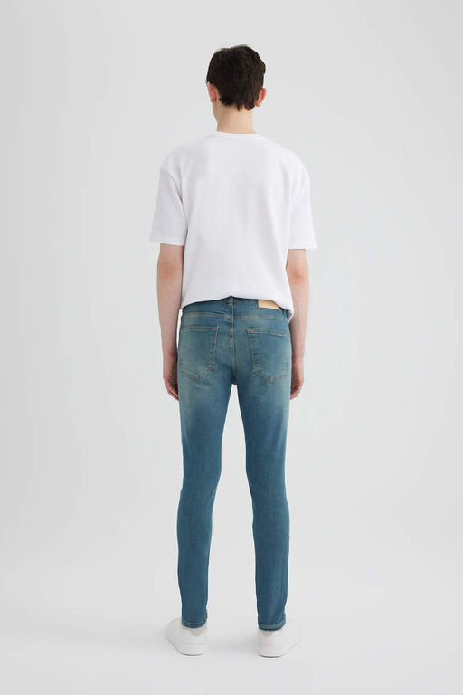 Супероблегающие джинсовые брюки с нормальной талией и очень узкими штанинами - Defacto фото 9