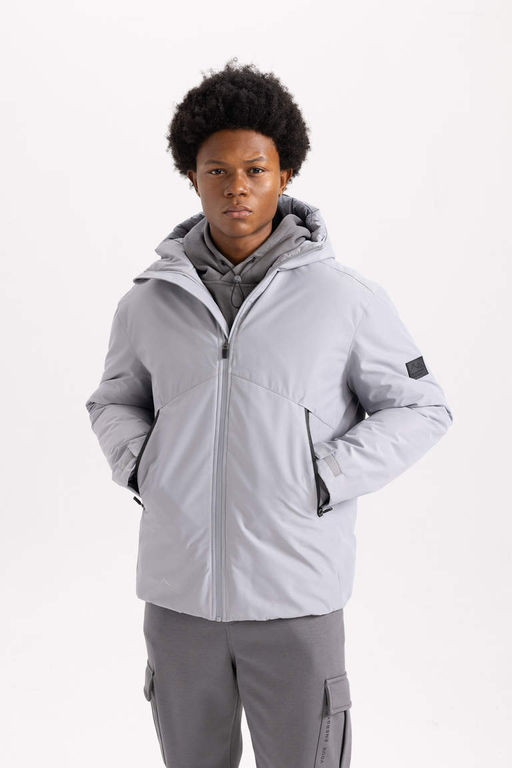 Водоотталкивающее водонепроницаемое пальто приталенного кроя DeFactoFit с капюшоном  фото 3