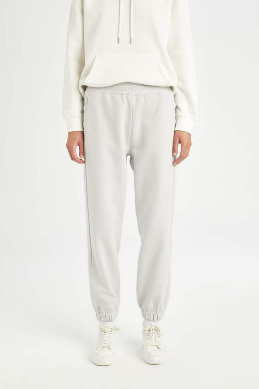 Базовые спортивные штаны для бега из плотной ткани стандартного размера с эластичным поясом и карманами - Defacto фото 4