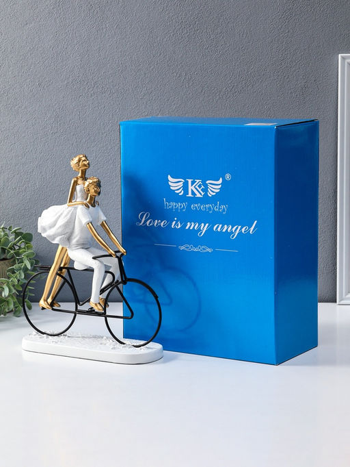 Сувенир полистоун "Парочка на велосипеде" бело-золотой 8,5х23х29 см