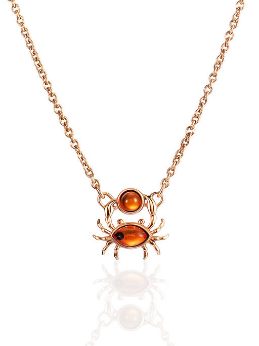 Милое минималистичное колье с янтарём коньячного оттенка Крабик