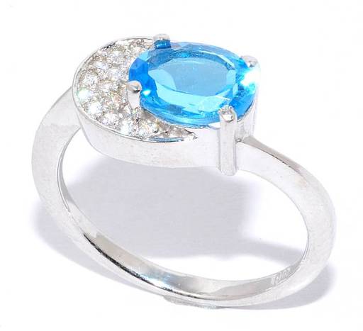 Кольцо с топазом "swiss blue"и куб.цирконием