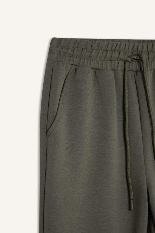 Длинные спортивные штаны для джоггеров стандартной посадки DeFactoFit с карманами и эластичными брючинами на талии  фото 2