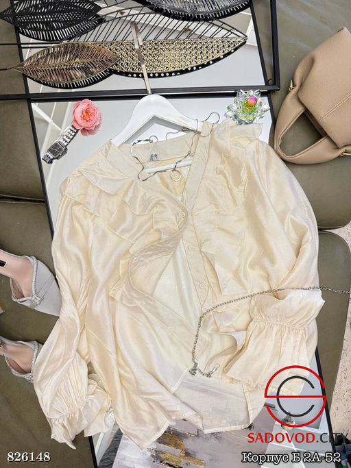 Нарядная блузка с воланами