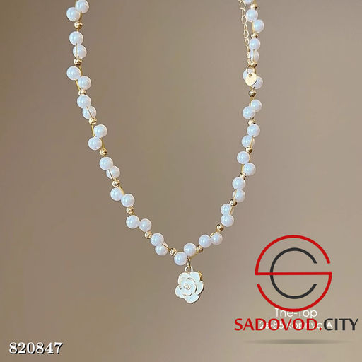 Жемчужное ожерелье с бабочкой