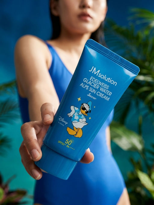 Jmsolution Охлаждающий солнцезащитный крем / Edelweiss Glacier Water Alps Moist Suncream Snow SPF50+/PA++++ Disney Donald Duck, 50 мл