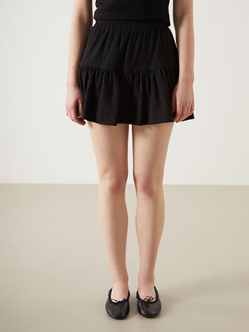 Beli Lastikli Dokulu Kad?n ?ortlu Etek