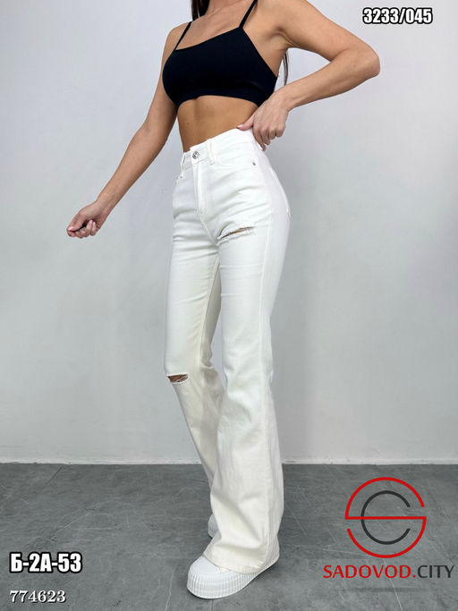 Женские рваные джинсы светлые