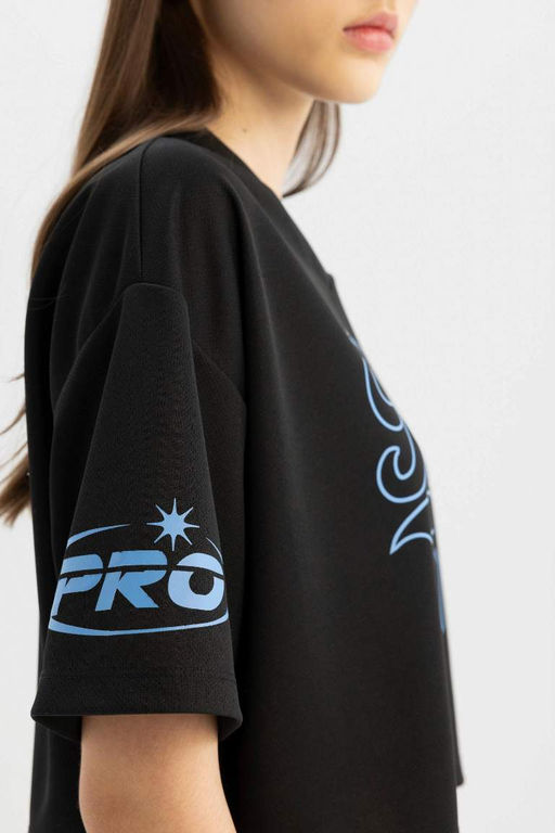 Крутая футболка оверсайз с V-образным вырезом и короткими рукавами с принтом - Defacto фото 5