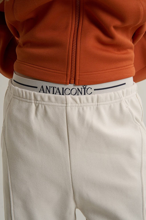 Брюки трикотажные Бежевый ICONIC Knit Track Pants - Anta фото 12