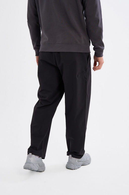 Брюки текстильные Черный ICONIC Woven Track Pants - Anta фото 5
