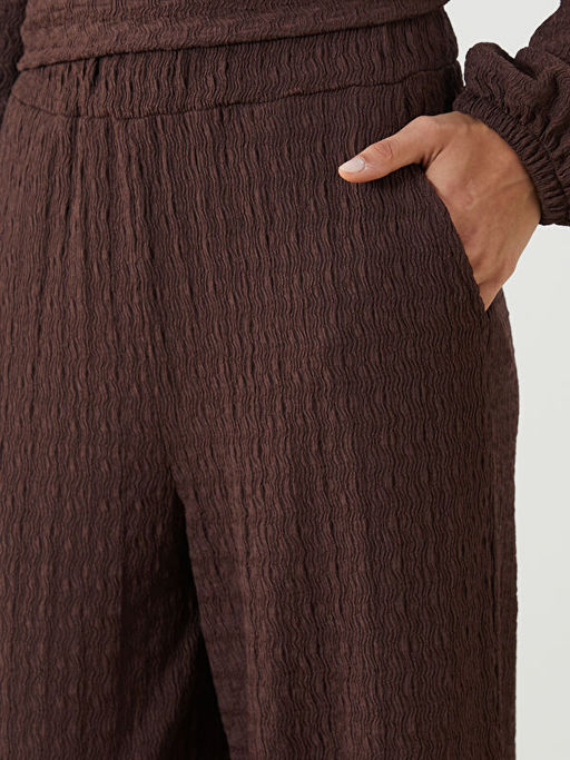Beli Lastikli Dokulu Kad?n Pantolon