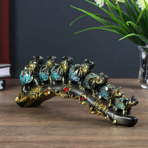 Сувенир полистоун "Семь слонов в синей попоне с кистями и зеркалами на бивне" 10х5,5х28 см