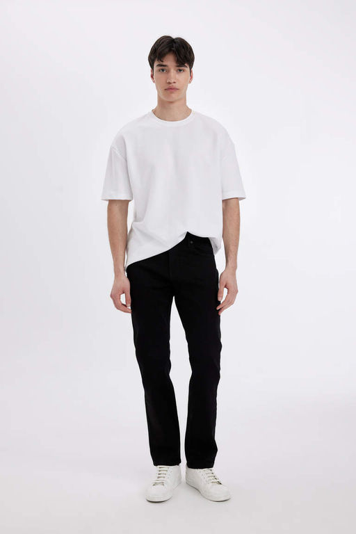 Джинсовые брюки Sergio Regular Fit Normal Mold с нормальной талией и зауженными штанинами - Defacto фото 2