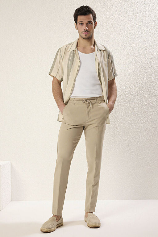 Ta_ Slim Fit Beli Ba_lama Detayl_ Lastikli Kuma_ Dokuma Pantolon TMNAW25PL00027
