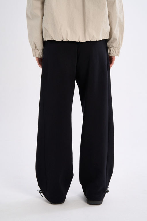 Брюки трикотажные Черный TRN Knit Track Pants - Anta фото 6