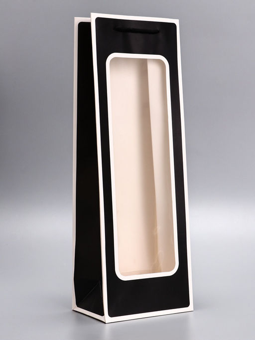 Цена за 12 шт. Пакет подарочный под бутылку с PVC окном 12.5×8.5×36 см, чёрный с белой каймой