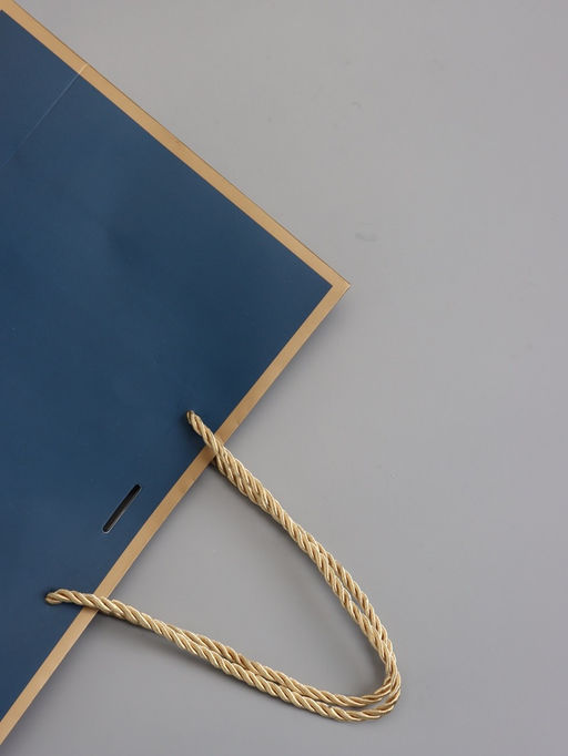 Пакет подарочный ламинированный, тёмно - синий с золотым, с бантом, 28×20×10 см