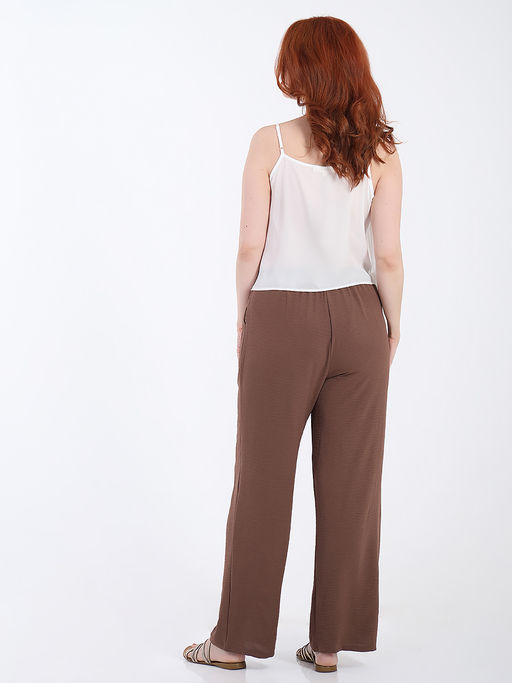 Брюки палаццо из жатки на резинке - Almond фото 32