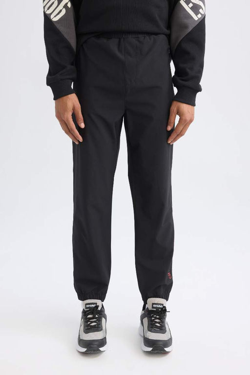 DeFactoFit NBA Chicago Bulls Спортивные спортивные штаны с эластичной резинкой и карманами для бега узкого кроя  фото 5