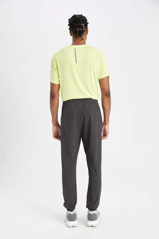 DeFactoFit Тканые спортивные штаны для бега стандартного кроя с двойными карманами  фото 7