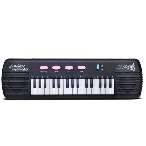 Синтезатор "Юнный композитор" в коробке