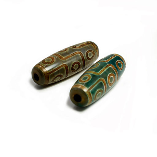 Бусина Дзи 9 глаз символизируют рост благосостояния от 9 планет