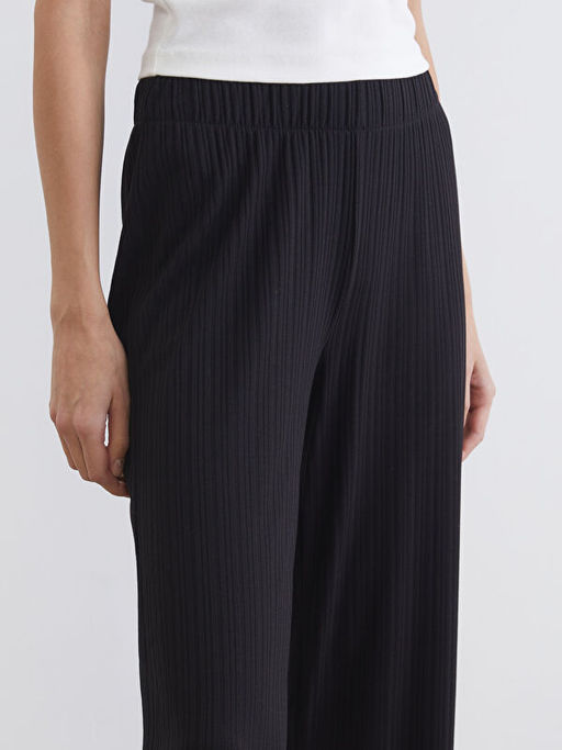 Beli Lastikli Dokulu Kad?n Pantolon