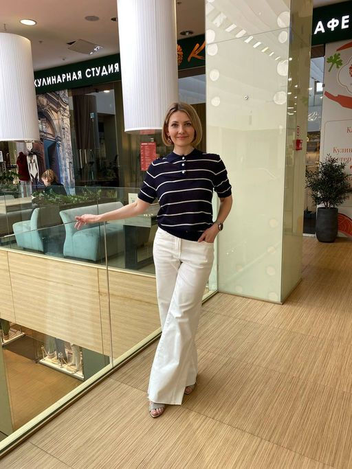 Джинсы клеш с прорезями и необработанным краем из эластичного денима средней плотности - Vilatte фото 9