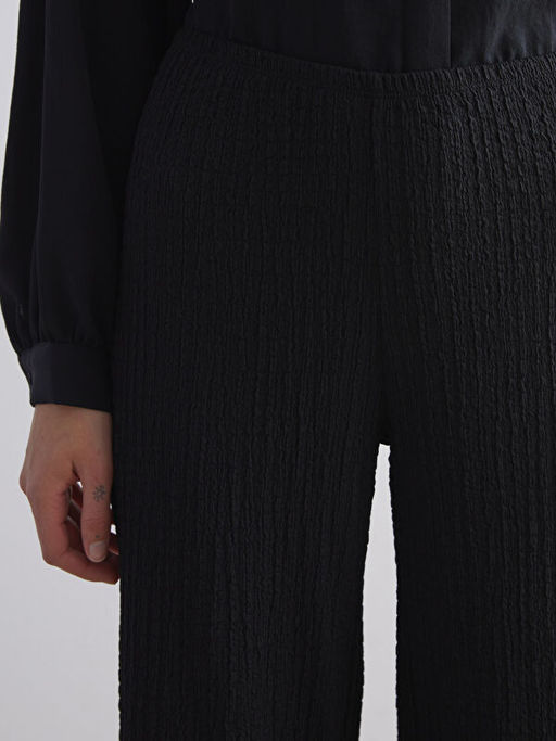 Beli Lastikli Dokulu Geni? Pa?a Kad?n Pantolon