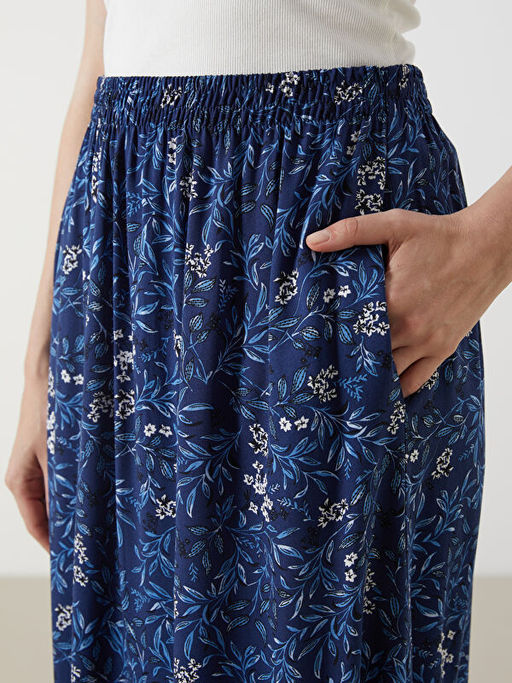 Beli Lastikli ?i?ekli Etek