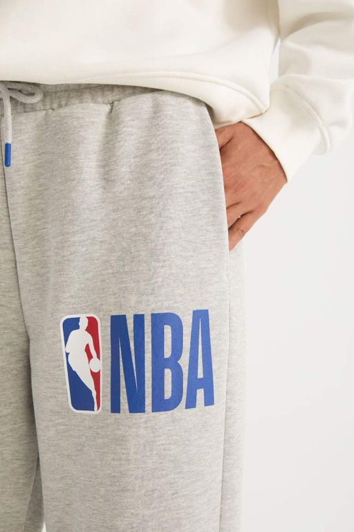 Длинные спортивные штаны DeFactoFit NBA с эластичным поясом, шнуровкой и карманом  фото 5