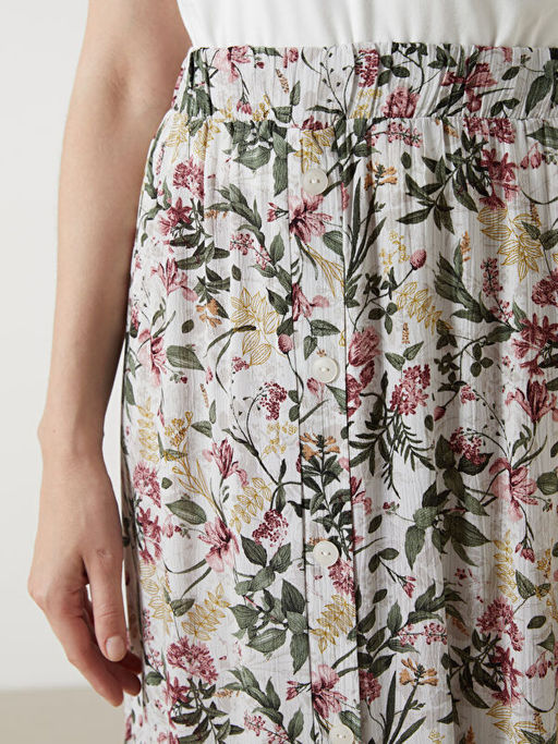 Beli Lastikli ?i?ekli A Kesim Etek