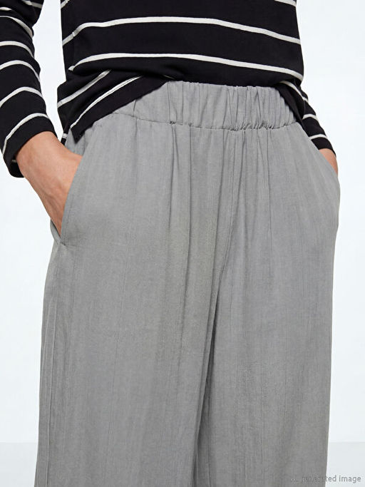 Beli Lastikli Dokulu Saten Kad?n Pantolon