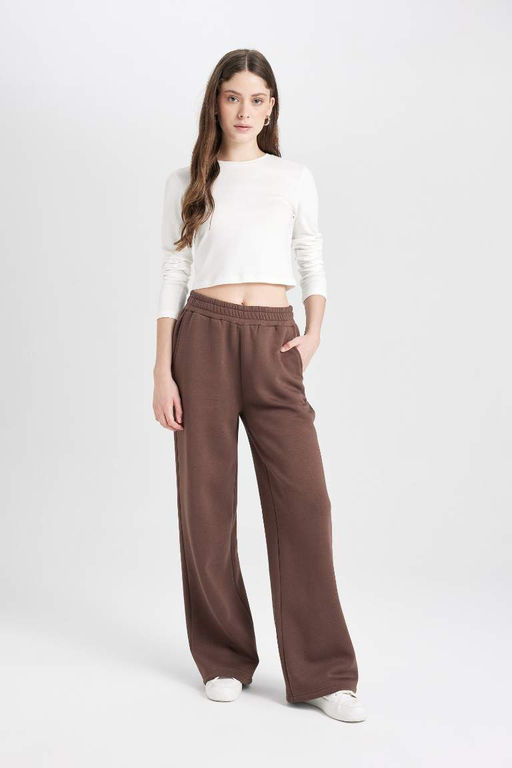 Простые спортивные штаны с широкими штанинами, эластичной талией, шнуровкой, карманами и широкими штанинами - Defacto фото 2