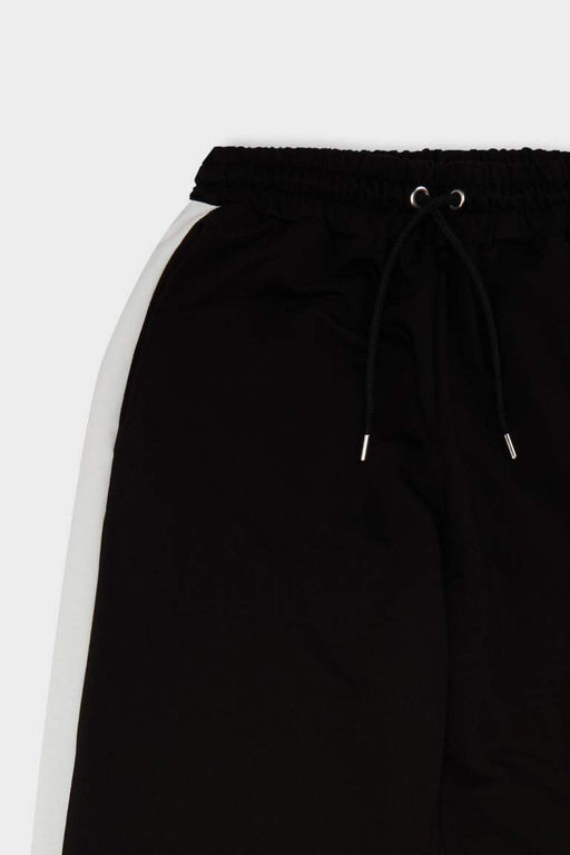 Стильные широкие спортивные штаны с широкими штанинами, эластичным поясом и полосками - Defacto фото 8