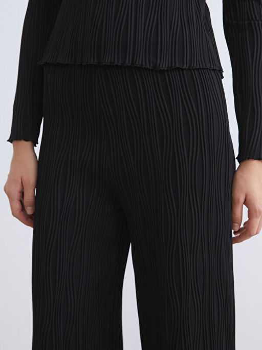 Beli Lastikli Dokulu Kad?n Pantolon