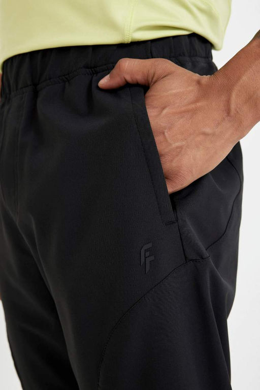 DeFactoFit Облегающие тканые спортивные штаны для бега с двумя карманами на молнии  фото 5