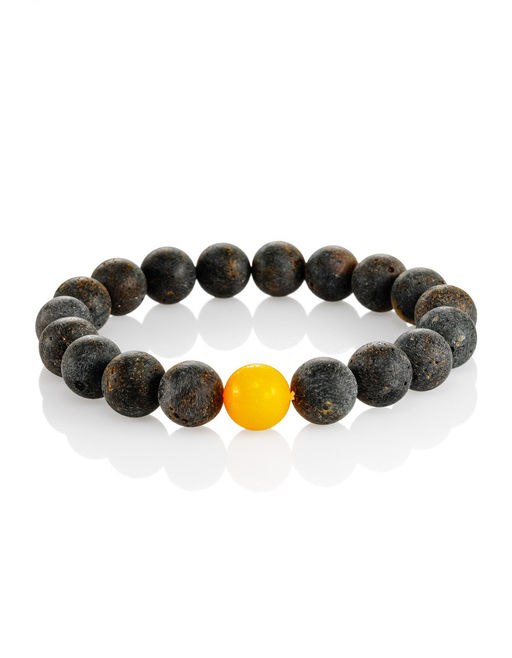 Яркий модный браслет из формованных янтарных шаров чёрного цвета Куба