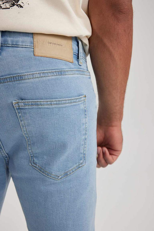 Супероблегающие джинсовые брюки с нормальной талией и очень узкими штанинами - Defacto фото 6