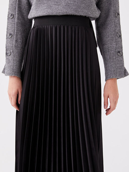 Beli Lastikli Kad?n Pileli Etek